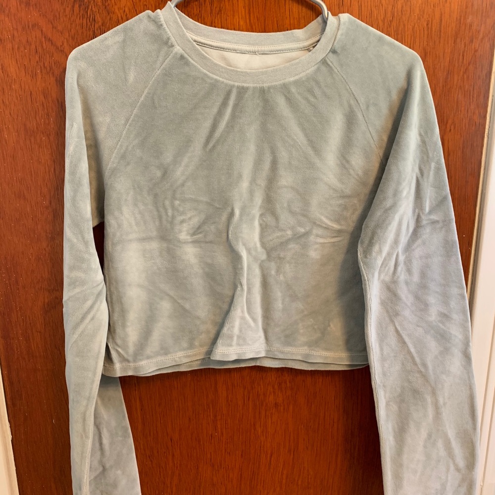 Cropped velvet sweater.